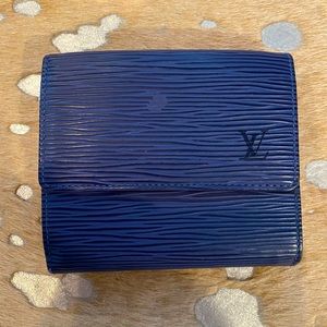 Authentic Like New blue Epi leather wallet.